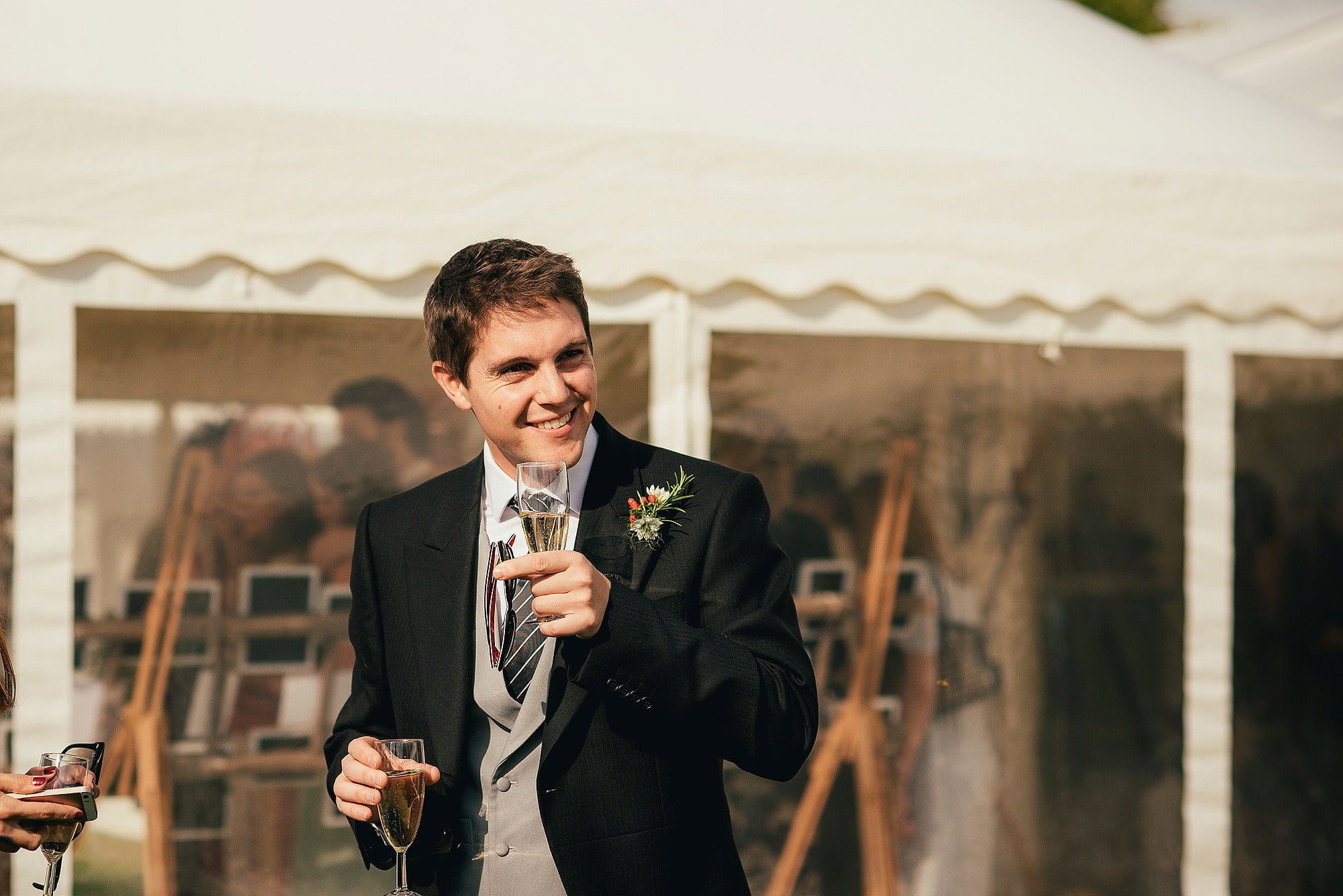 groomsman with champagne 