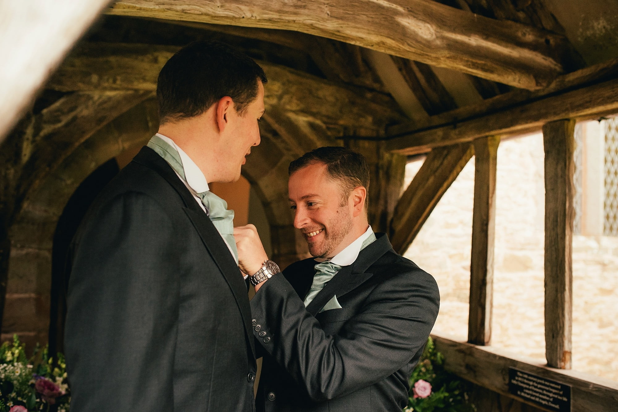groom and best man at Dewsall Court